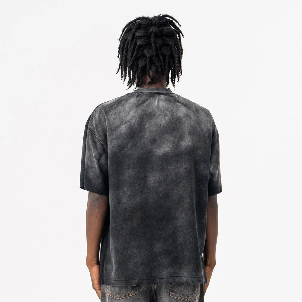 Black men's loose-fit cotton t-shirt with drop-shoulder sleeves and a printed letter pattern.