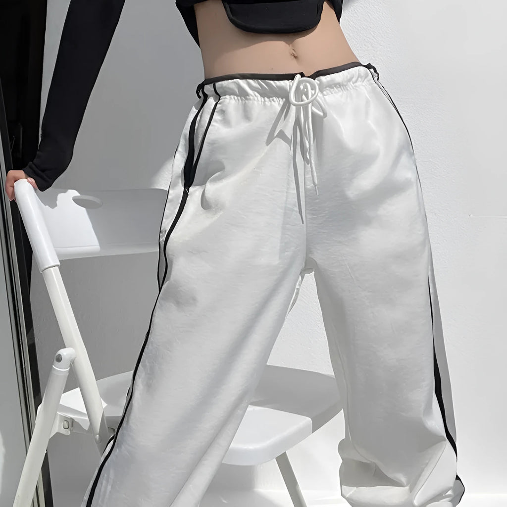 Women's loose straight trousers with contrast ribbon parallel bars detailing in white and navy blue options