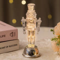 Transparent plastic Walnut Soldier nutcracker Christmas ornament, 12cm tall.