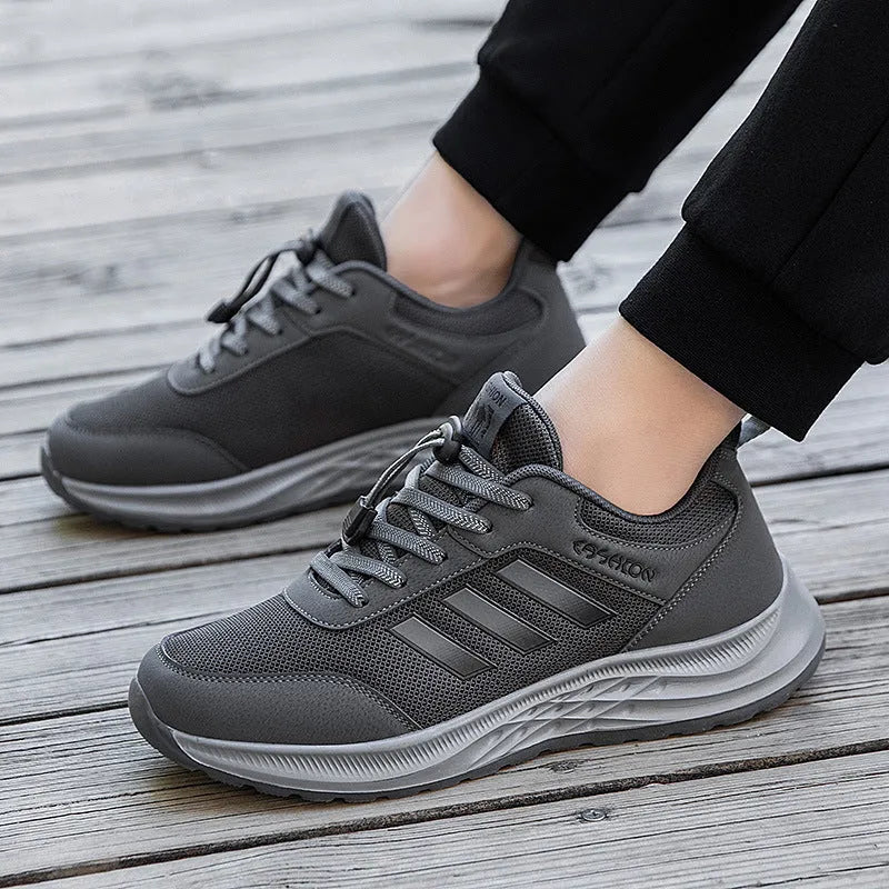 Casual breathable mesh slip-on shoes for men and women with elastic band and non-slip sole.