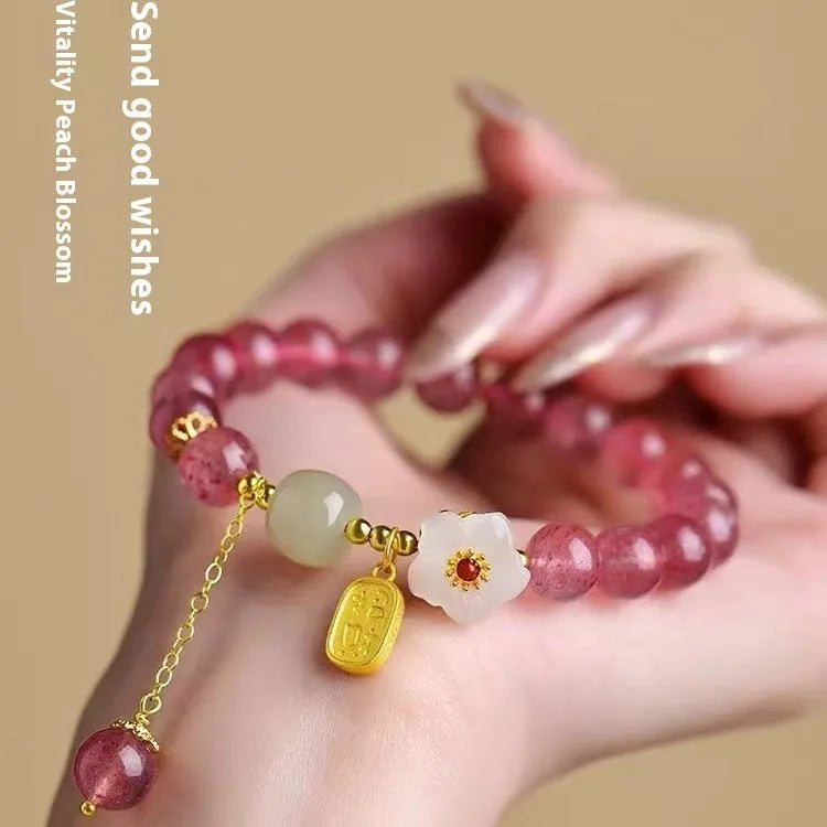 Handmade strawberry quartz crystal bracelet with green quartz moon charm for women