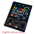 Large rectangular scratch art paper for children with a scraping tool on a colourful puzzle design background.