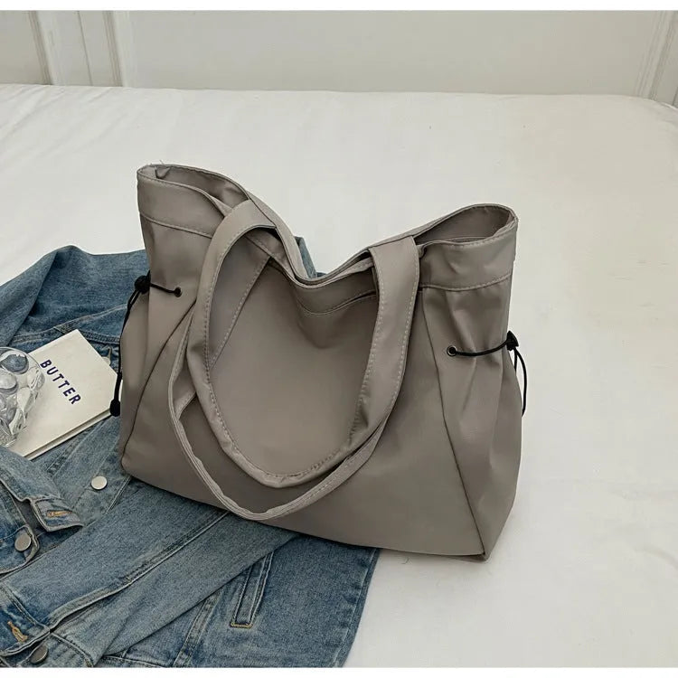 Soft Oxford cloth folding tote bag in street trend style shown in multiple colour options