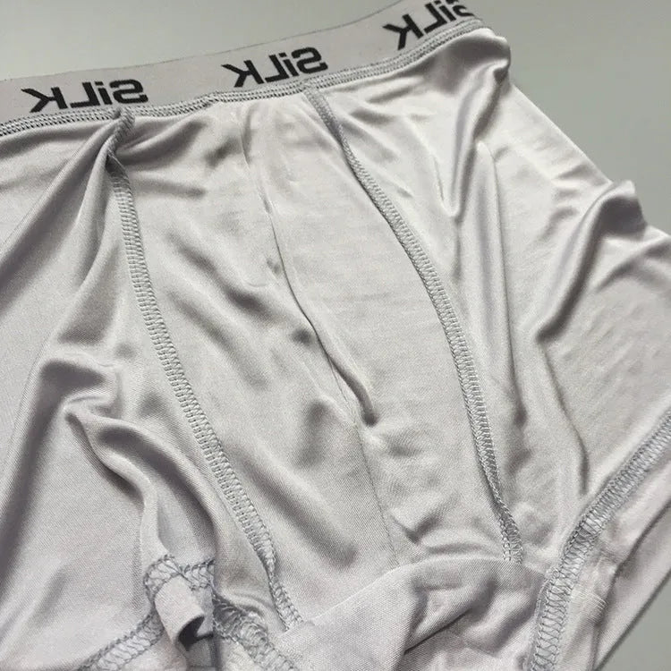 Men's loose fit silk shorts in navy blue, silver grey, or skin colour with mid-waist design