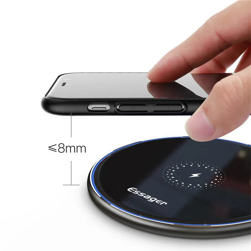 Black and white aluminium alloy wireless charging pad for phones with Qi fast charging and LED light.