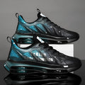 Men's black and green platform trainers with mesh upper and rubber sole
