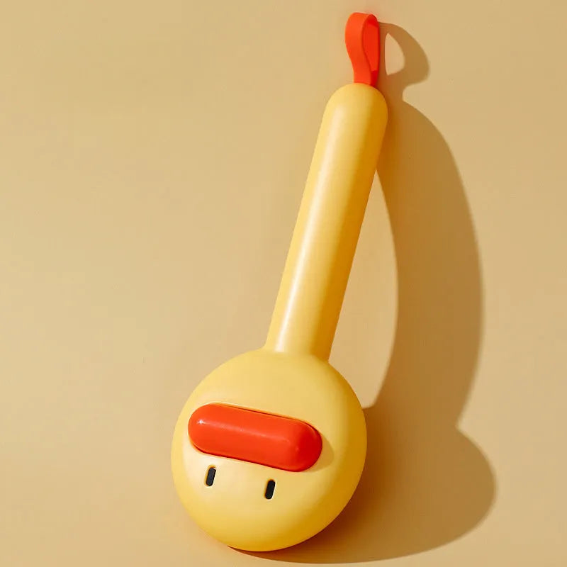Small yellow duck-shaped pet comb with open and needle teeth for grooming cats and dogs.