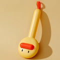 Small yellow duck-shaped pet comb with open and needle teeth for grooming cats and dogs.