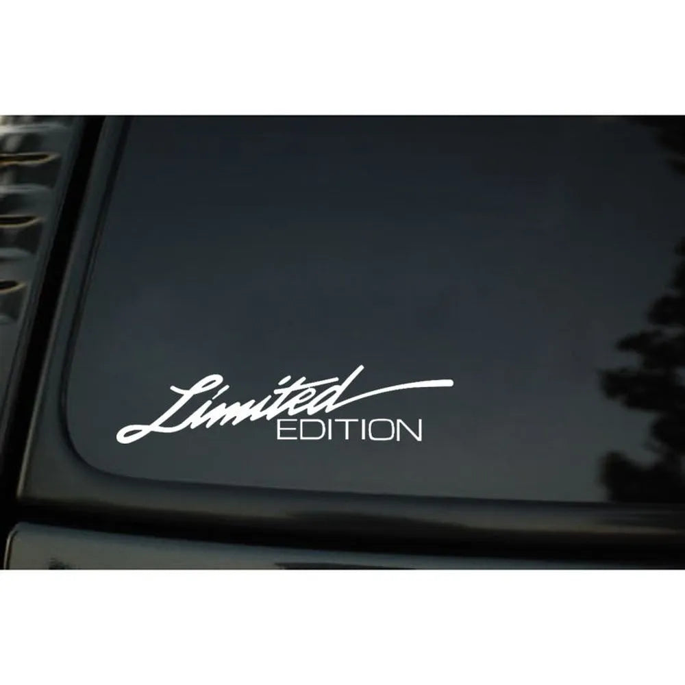 Reflective British style bumper sticker on car, showing black, white and colourful options.