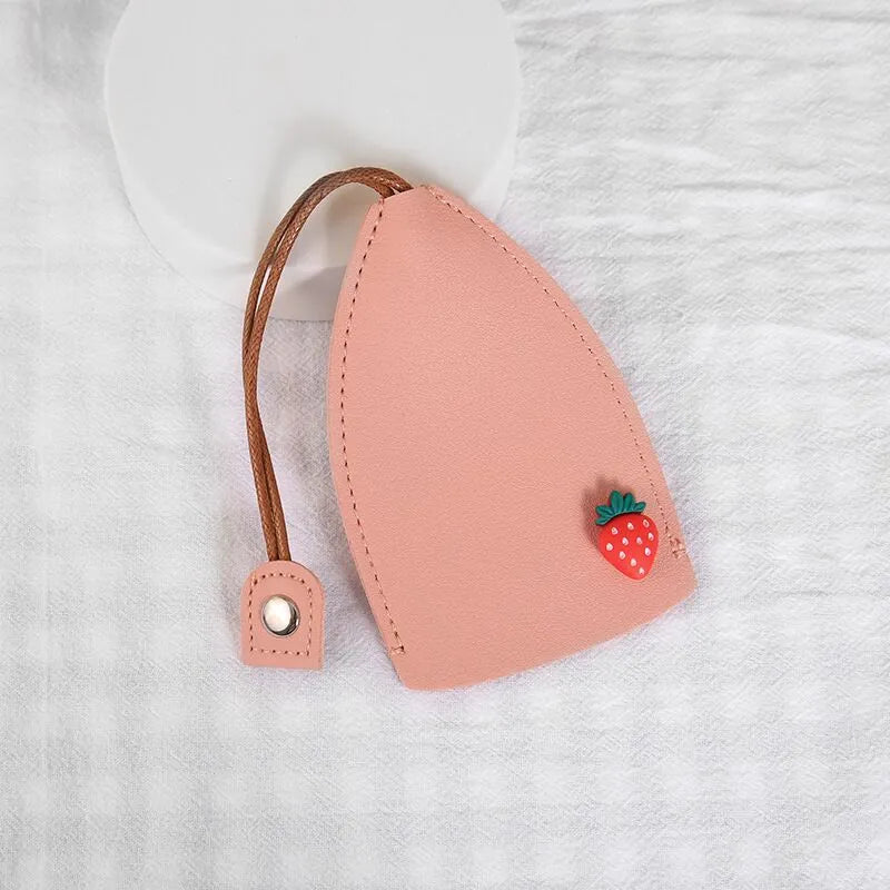 Cartoon pull-out key case in PU leather measuring 14 by 7.5 centimetres
