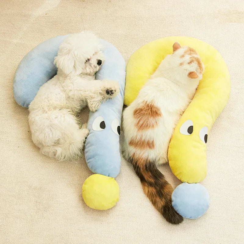 A rectangular blue or yellow pet pillow for cats and dogs, measuring 62cm by 39cm.