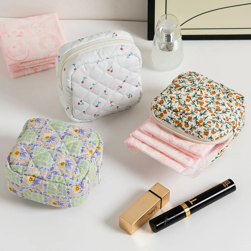 Floral pattern key storage bag made from breathable polyester fabric in various colour options.