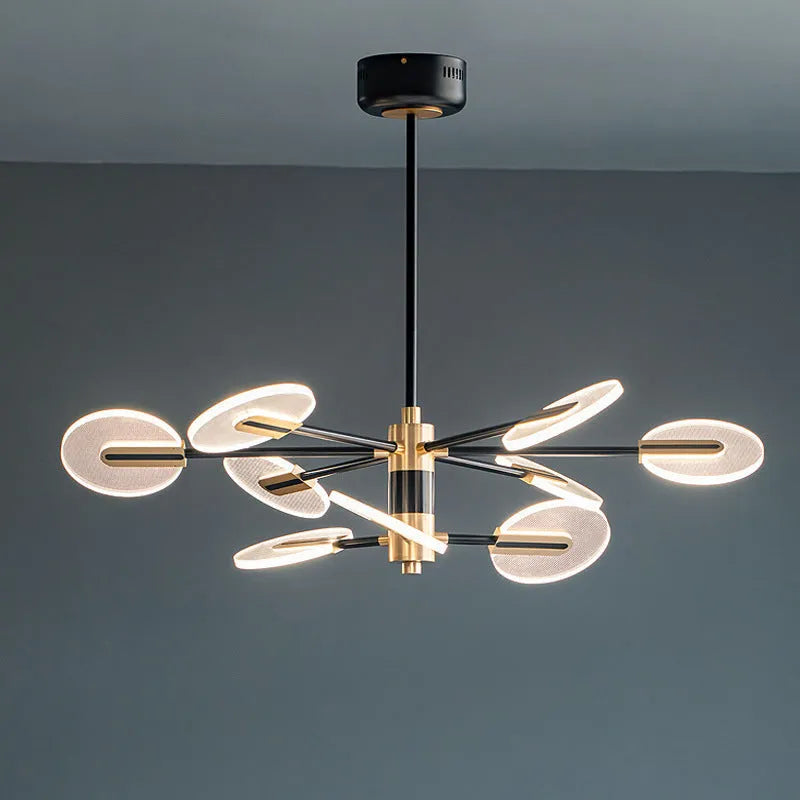 Nordic style black iron chandelier with multiple acrylic lamp shades hanging from ceiling