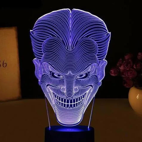 3D acrylic LED lamp showing colourful illumination on a square base, with remote control and USB cable