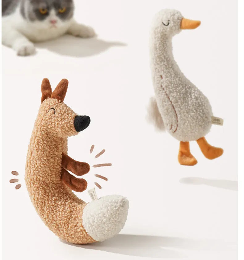 Fox and duckling cartoon plush dog toys with squeakers on a neutral background.