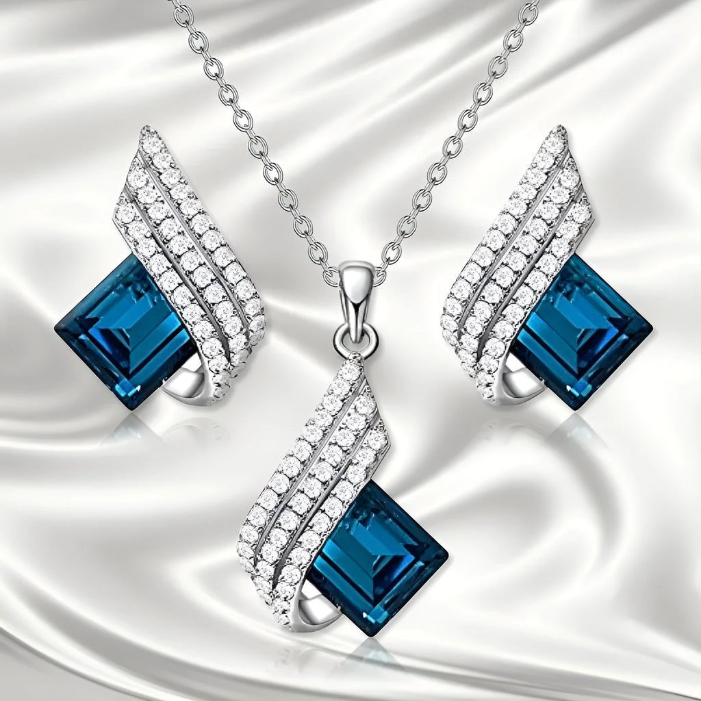 Women's necklace and ear stud set with alloy pendant, cross chain, and glass detailing in electroplated finish