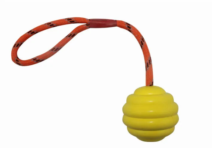 Multi-coloured rubber dog chew ball with rope knots measuring 6x30cm