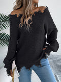 White hollow-out cut off-the-shoulder pullover sweater with long sleeves on a hanger.