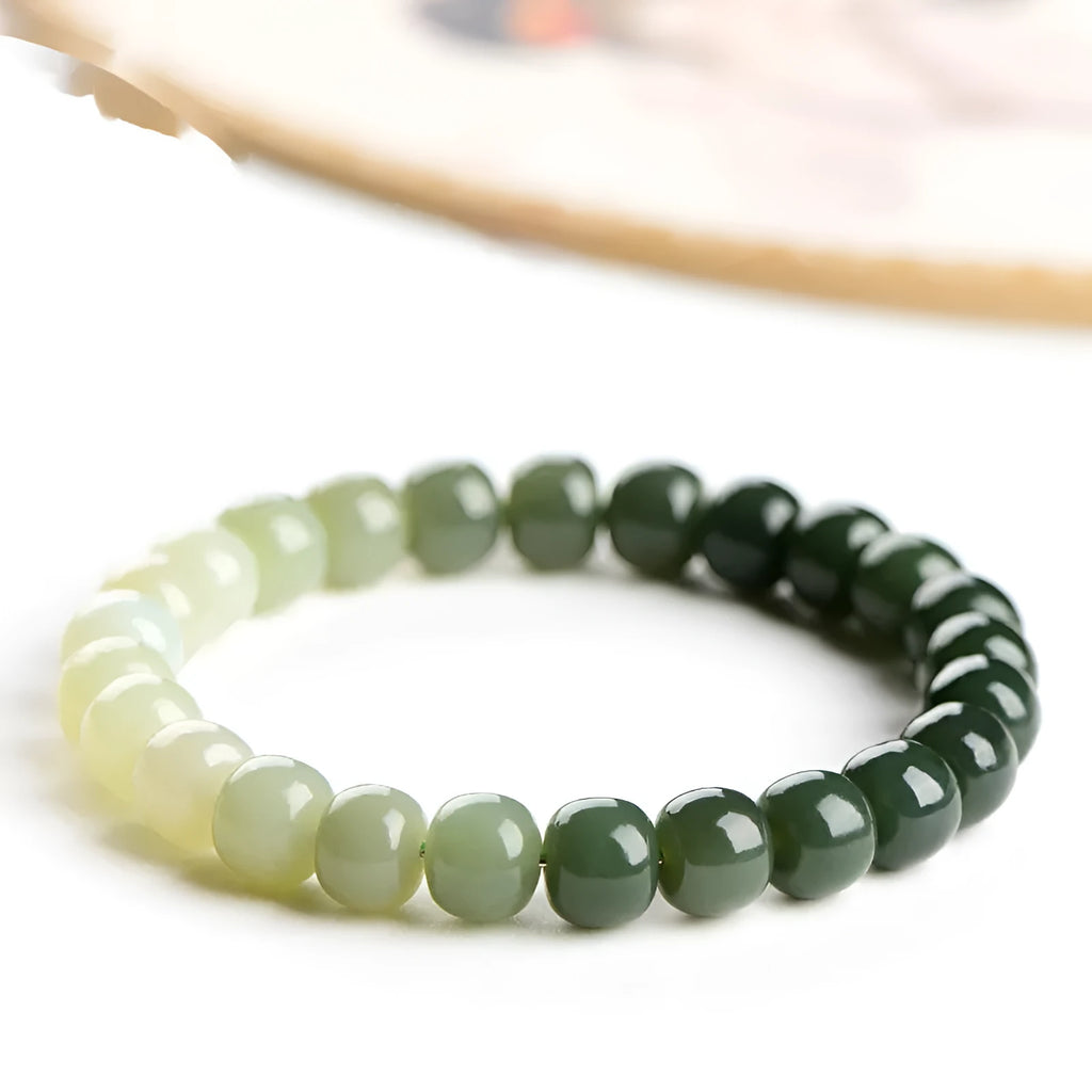 Natural Hetian jade bracelet with gradient clear water colour beads in polished finish