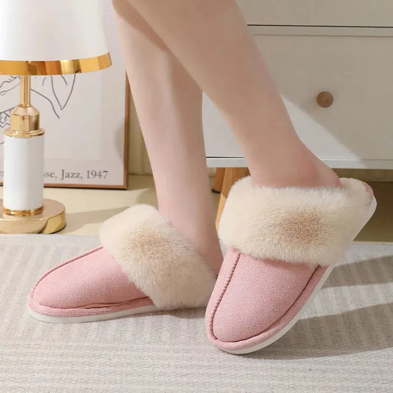 Women's brown plush indoor slippers with round toe, flat heel, and non-slip sole.