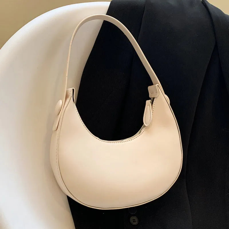 Retro dumpling-shaped women's shoulder bag in PU leather with zippered compartment