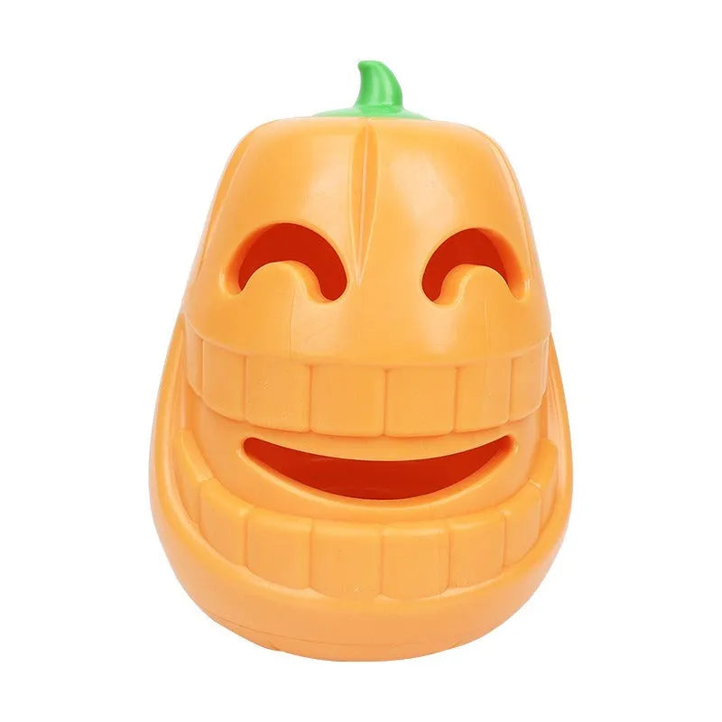 Orange Halloween pumpkin shaped dog chew toy made of durable rubber with a treat-dispensing funnel.