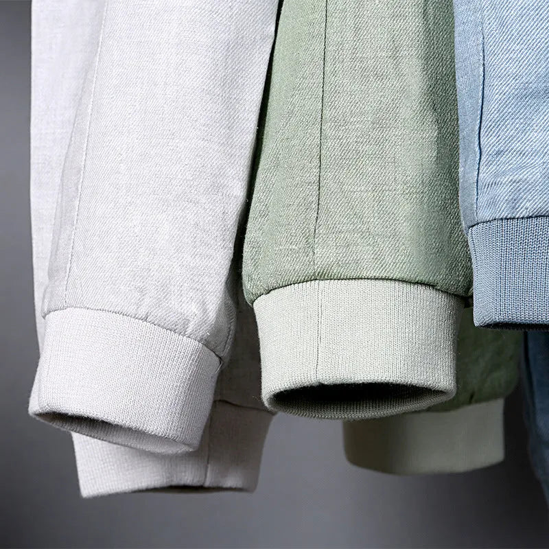 Men's heather gray cotton linen jacket in a regular fit on a hanger.
