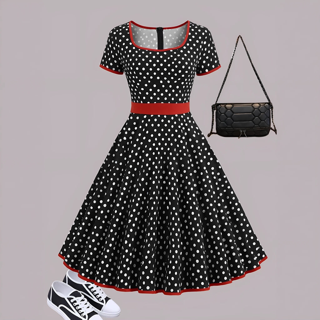 Women's multicolor polka dot dress with square collar, short sleeves, front zipper, and pleated mid-length skirt.