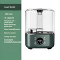 Green KC-112 large capacity intelligent humidifier with touch screen display and remote control on a table.