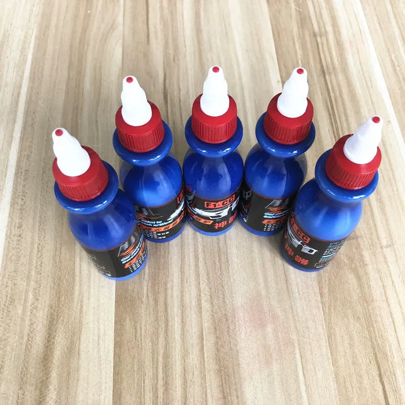 Small blue tube of car scratch repair gel for automotive paint touch-ups.
