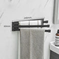 Black folding towel bar with adhesive installation for bathroom