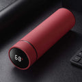 Black stainless steel water bottle with double wall vacuum insulation and arrow mouth, 450ml capacity.