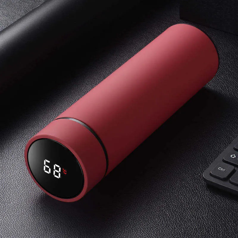 Black stainless steel water bottle with double wall vacuum insulation and arrow mouth, 450ml capacity.