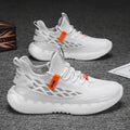 Men's white mesh platform sneakers with woven design and flat rubber sole