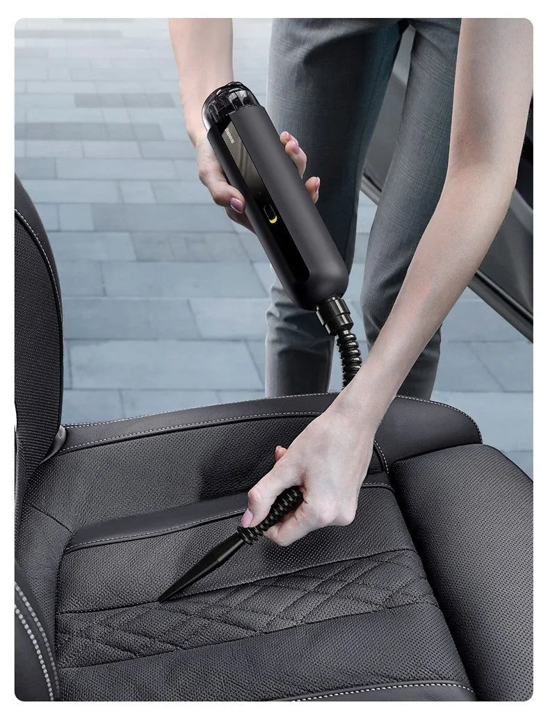Wireless handheld car vacuum cleaner in black, white, or green with blowing hose attachment.