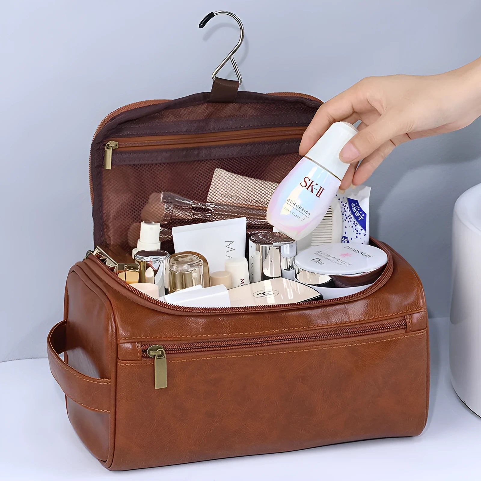 Large waterproof cosmetic storage bag in brown PU leather with a retro style design.