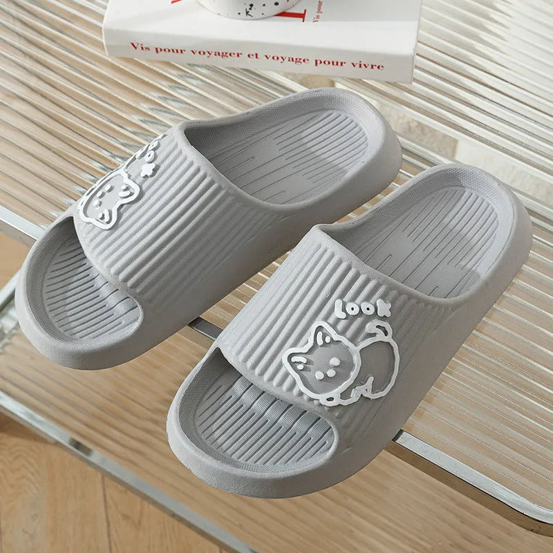 Green EVA foam cat slippers with thick platform sole and anti-slip pattern.