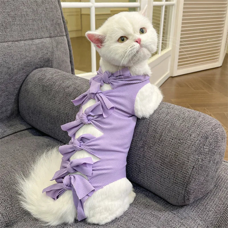 Lace-up polyester cat sterilisation recovery suit in assorted colours on a size chart