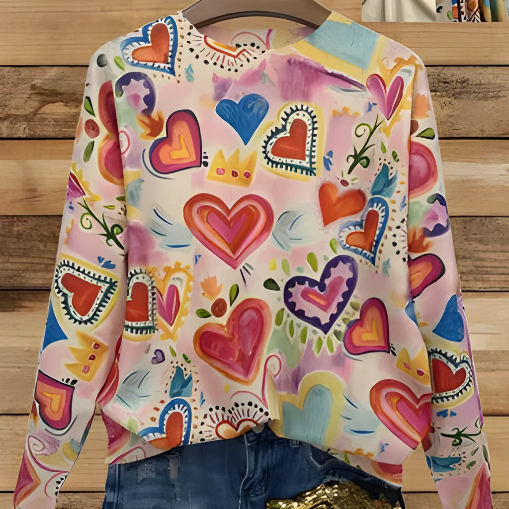 Women's loose-fit digital printed top with lapel collar in various sizes showing vibrant print design