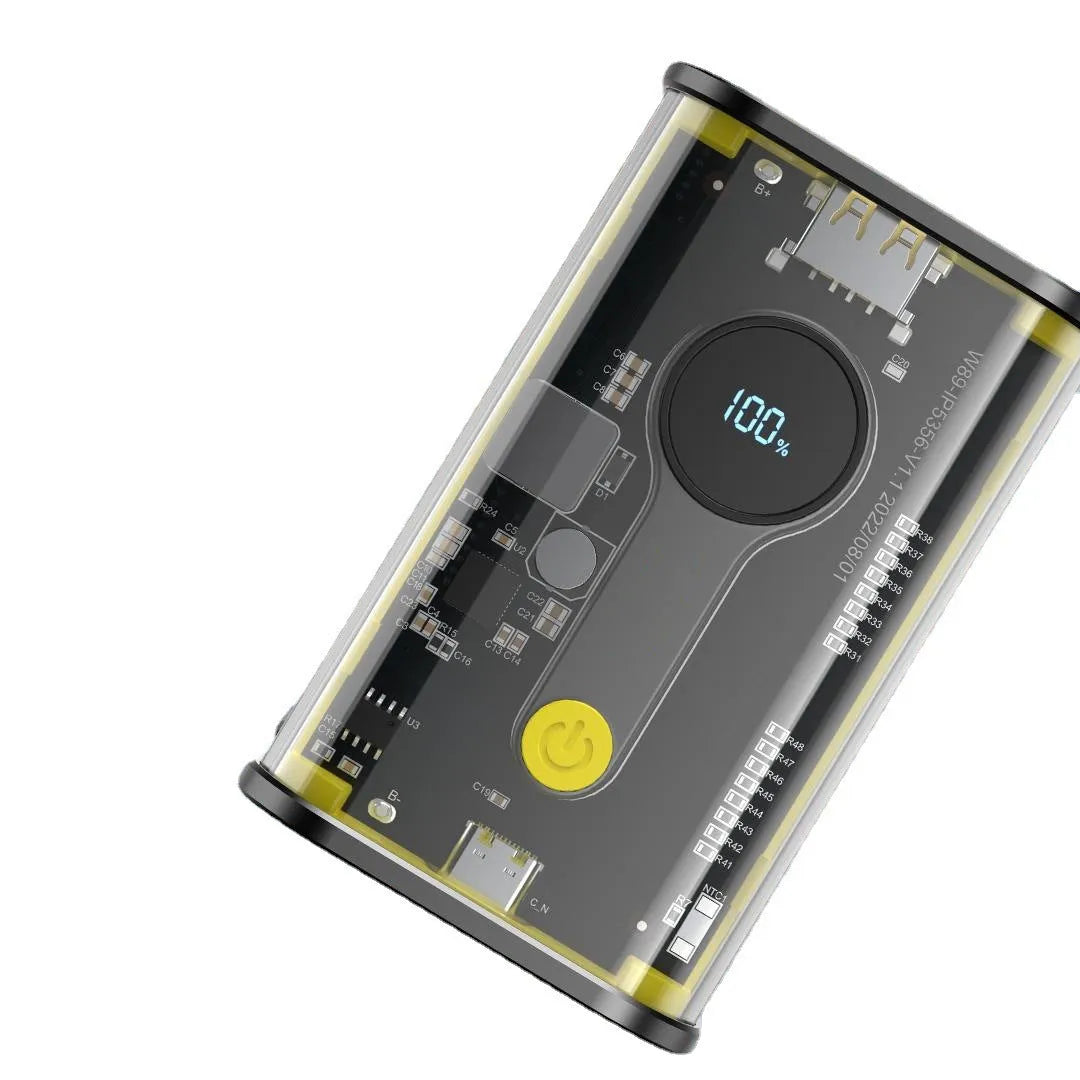 Transparent yellow industrial power bank showing internal components with 10000mAh capacity label