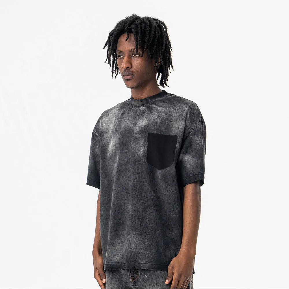 Black men's loose-fit cotton t-shirt with drop-shoulder sleeves and a printed letter pattern.