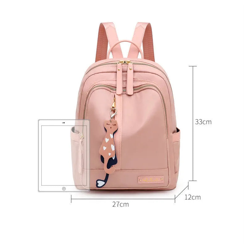 Women's black nylon casual backpack with double shoulder straps and external pockets