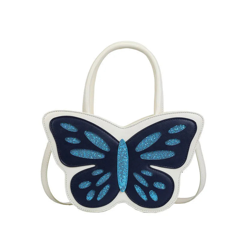 Small square white PU crossbody bag with contrast colour detailing on a model.