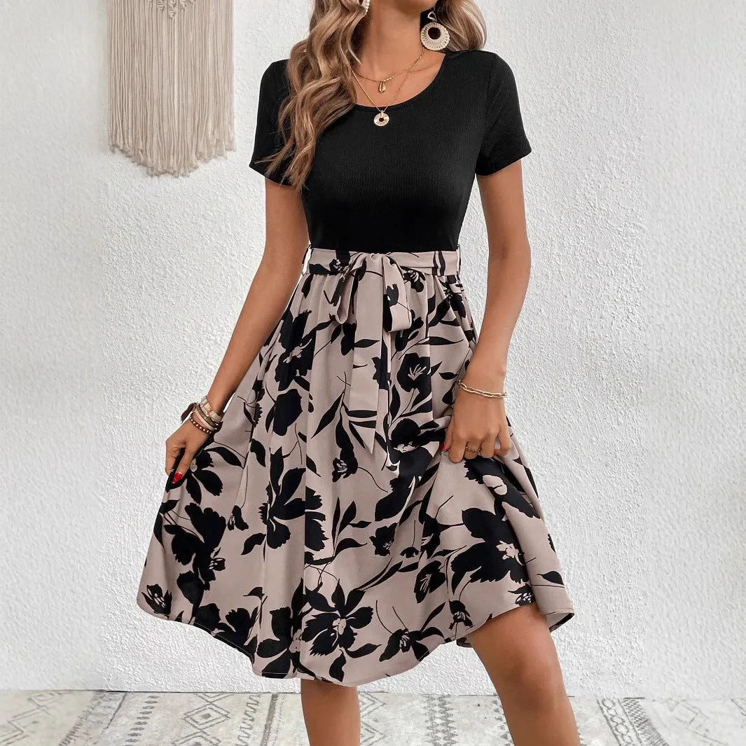 Women's khaki A-line dress with plant print, lace-up detail, and shoulder strap