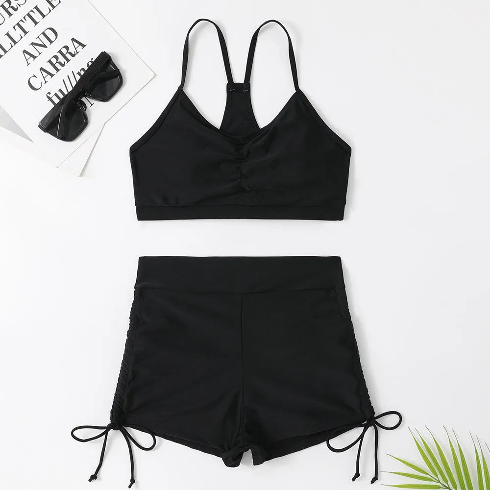 Women's purple high-waist split swimsuit bikini set with sleeveless top and matching briefs