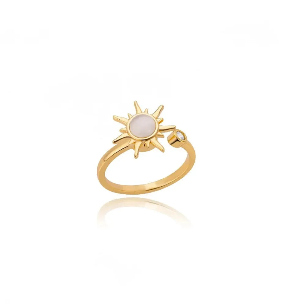 Simple geometric rotatable decompression ring with adjustable opening in gold electroplated finish