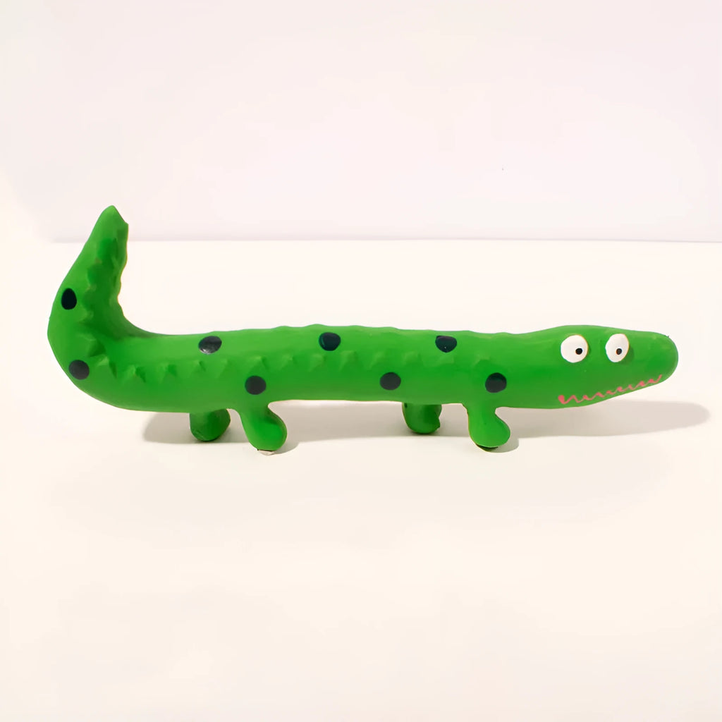 Green cartoon lizard-shaped dog chew toy with squeaker for aggressive chewers.