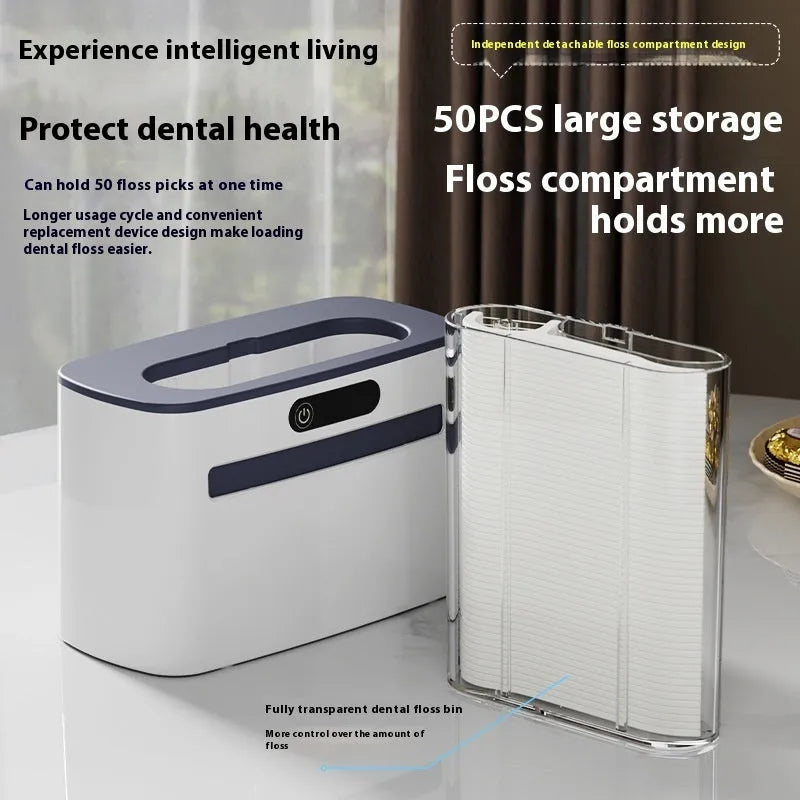 Dark grey automatic electric dental floss box with rechargeable battery and floss refills