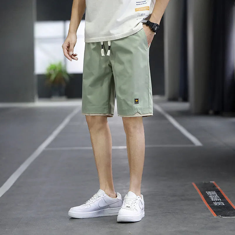 South Korea style casual beach shorts with loose fit and straight cut in micro-elastic polyester fabric