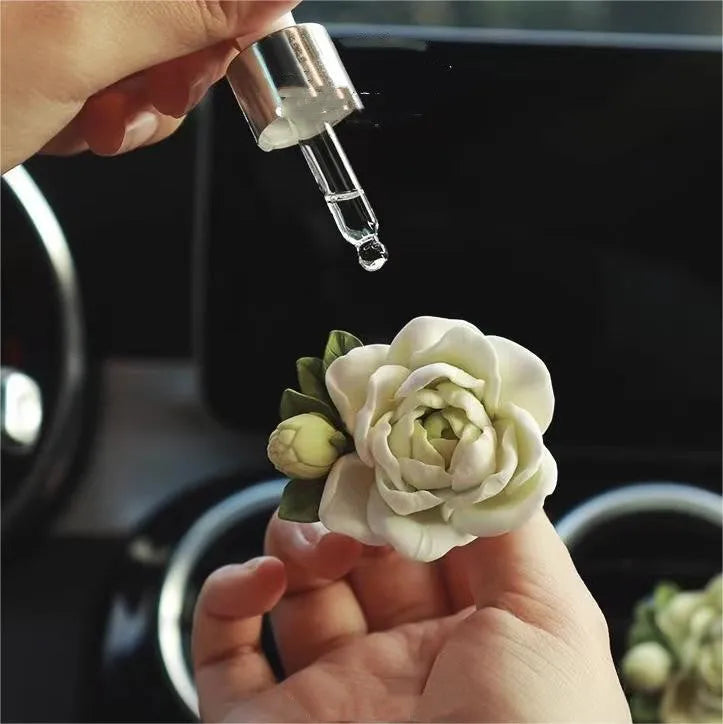 Jasmine car perfume diffuser on air vent with 5ml essential oil bottle